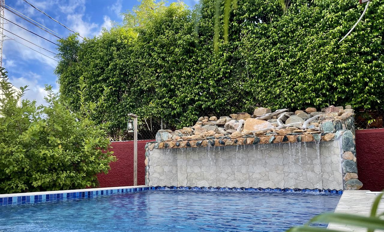 Haven’s private 2.5 ft pool and stone waterfall in the garden